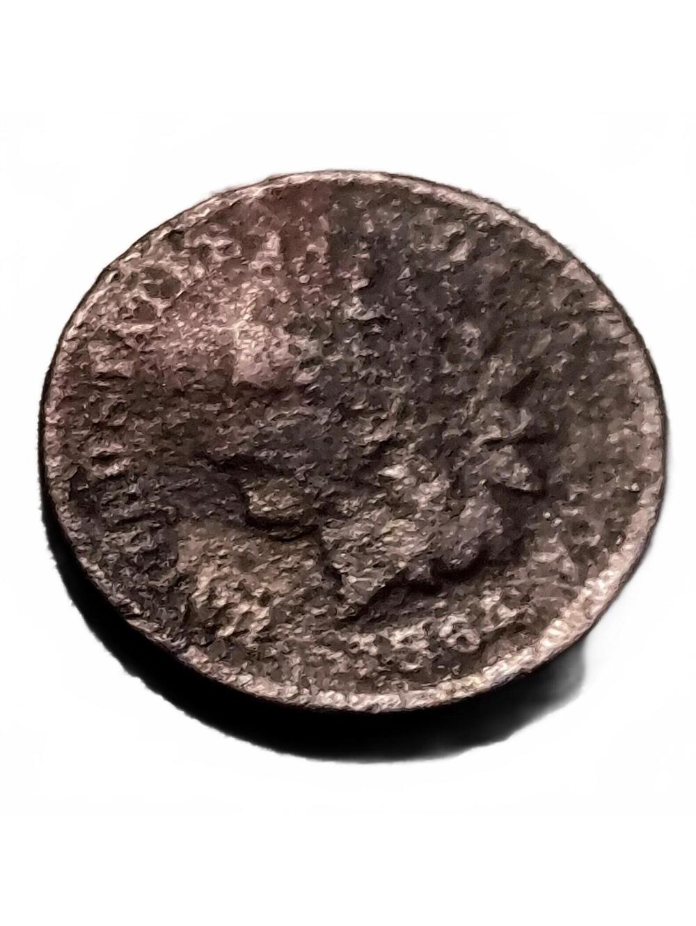 1864 L? I think, but you decide Indian Head Penny bent #264